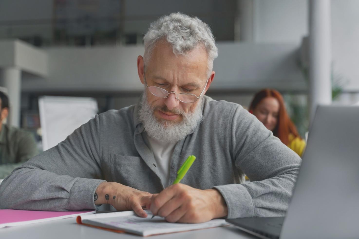 Group of participants discussing investment strategies during workshop session